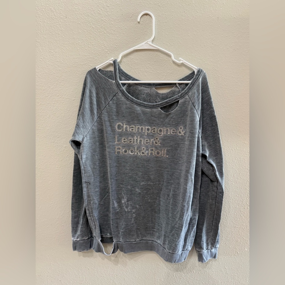 CUTE AND TRENDY DISTRESSED SWEATSHIRT